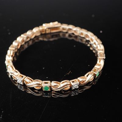 Sterling Silver with Green Stone Accents Tennis Bracelet. Sterling silver link bracelet finished 