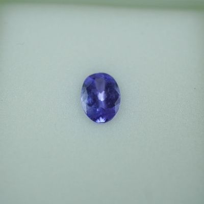 0.60 CT Tanzanite Oval Cut Gemstone. This captivating 0.60-carat tanzanite gemstone features a 