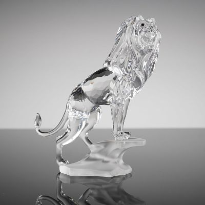 Swarovski Crystal Figurine Lion Standing on a Rock, Model 269377. A Swarovski Crystal Figurine 