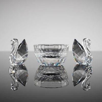 A Trio of Swarovski Swans and Cubism Bowl. A collection of three items executed in clear 