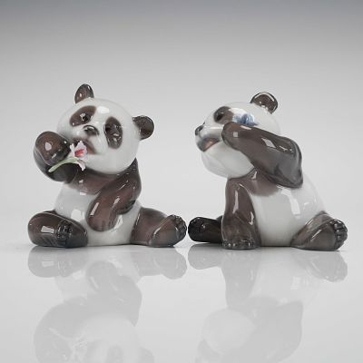 A Pair of Lladro Porcelain Panda Figurines. A pair of Lladro porcelain figurines, depicting 