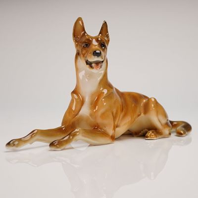 Hutschenreuther Porcelain Figurine of a Recumbent German Shepherd Dog. A single porcelain 
