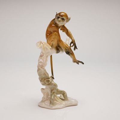 Hutschenreuther Porcelain Monkey in Tree Figurine. A single glazed porcelain figurine depicting 