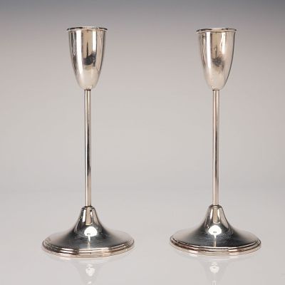 A Pair of Empire Sterling Silver Weighted Candlesticks. A pair of sterling silver candle holders 
