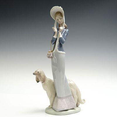 Lladro Porcelain Figurine, Stepping Out 01001537. This sophisticated Lladro porcelain figurine 