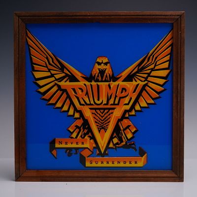 Triumph, Never Surrender Framed Glass Panel. Vibrant Triumph glass panel featuring a bold eagle 