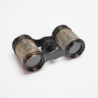 French Repousse Opera Glasses. The piece is constructed of metal, featuring a black frame and 