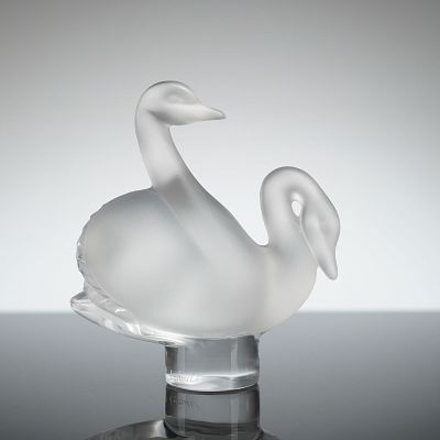 Lalique Crystal Two Swans Paperweight. The piece is executed in colorless crystal glass 