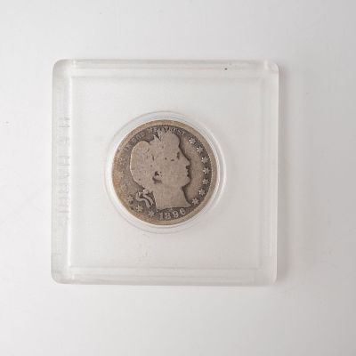 1896-O Barber Quarter Dollar Coin. Struck at the historic New Orleans Mint as denoted by the 