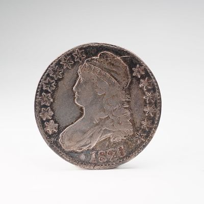 1826-(P) Capped Bust Half Silver Dollar. This coin features the capped bust, depicting Liberty 