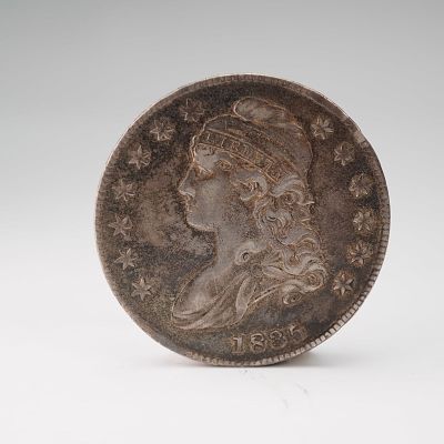 1835-(P) Capped Bust Half Silver Dollar. Struck at the Philadelphia Mint, this coin features the 