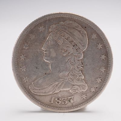 1837 Capped Bust Half Dollar. Silver coin composed of .8924 silver and .1076 copper. The obverse 