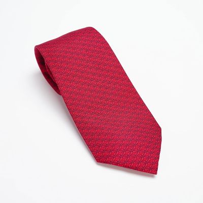 Hermes Red Geometric Interlocking Circle Pattern Silk Tie. This luxury men's necktie is 