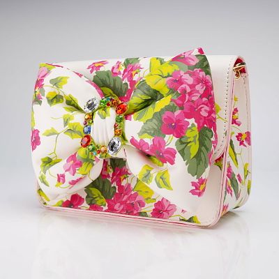 Betsey Johnson Floral Bow Crossbody Purse. A contemporary Betsey Johnson purse, styled as a 