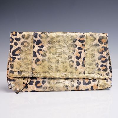 B. May Foldover Python Clutch Purse. A striking foldover clutch by b. may, crafted from genuine 