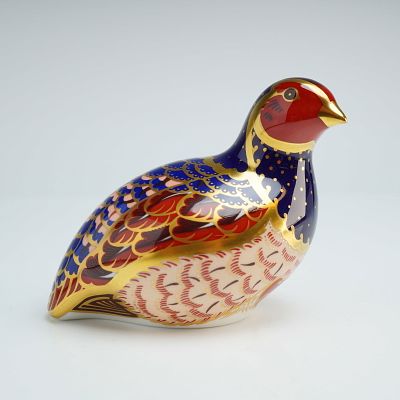 Royal Crown Derby Paperweight, Partridge. The piece is decorated in the Imari style with a 