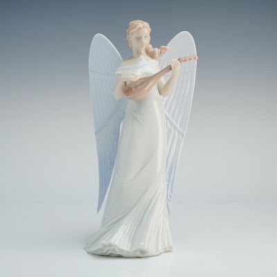 Lladro Porcelain Tree Topper Figurine, Celestial Joy 1008080. This glazed porcelain figure 