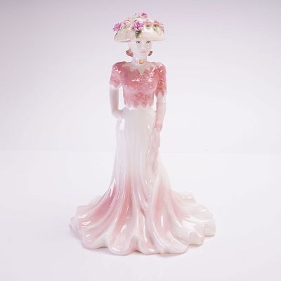 Coalport Ladies of Fashion Figurine, Liz. A Coalport figurine was modeled by Jenny Oliver. This 