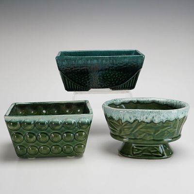 Three McCoy Pottery Green Glazed Jardinieres. A trio of glazed ceramic planters, or jardinieres 