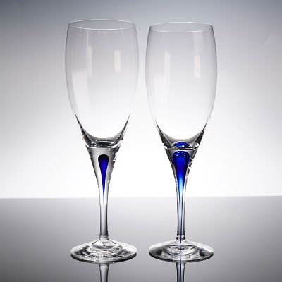 A Pair of Orrefors Intermezzo Blue Sparkling Wine Flutes. A pair of Orrefors Intermezzo Blue 
