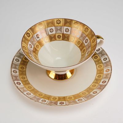 2pc Mitterteich Bavaria Porcelain Tea Set, Geometric Gilt. A 2-piece cup and saucer set executed 