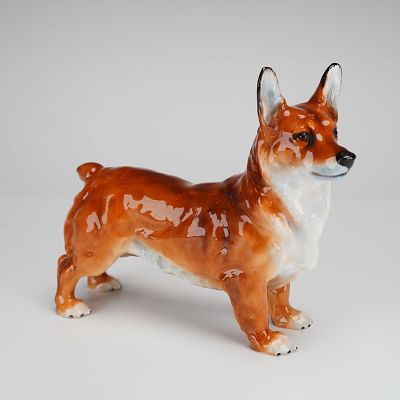 Royal Doulton Bone China Dog Figurine, Welsh Corgi HN2558. This piece is modeled in a standing 