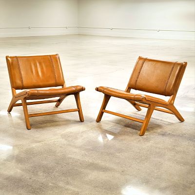 Pair of Olivier De Schrijver Relax Chairs in Natural Leather, Cowboy. A pair of Olivier De 