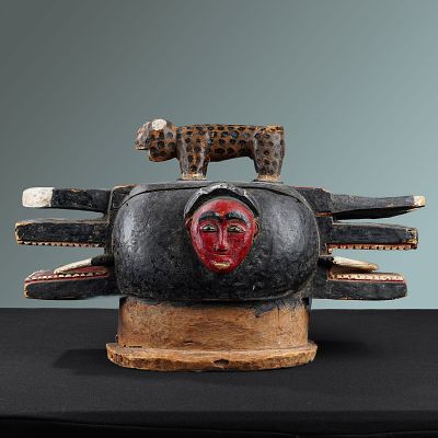 African Baule Goli Glin Helmet Mask. From the Ivory Coast is a carved wooden mask decorated with 
