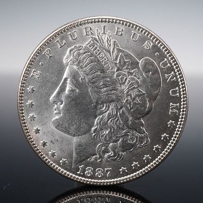 1887 Morgan Silver Dollar. Minted in 1887, this Morgan Silver Dollar was struck in the 