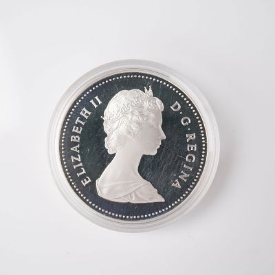 1982 Canadian Elizabeth II Regina Centennial Dollar Coin. Commemorating the 100th anniversary of 