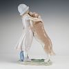 Lladro A Warm Welcome Porcelain Figurine Model 6903. A fine glazed porcelain figurine produced Image - 1