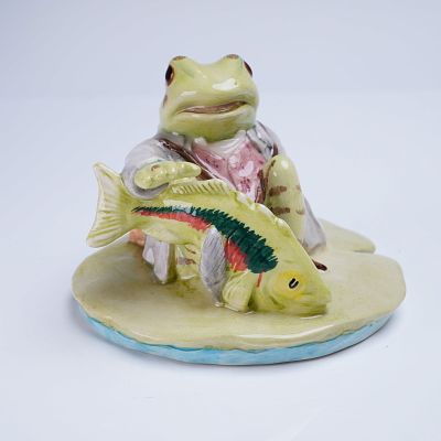 Beswick Beatrix Potter Figurine, Jeremy Fisher Catches a Fish. A glazed ceramic figurine from 