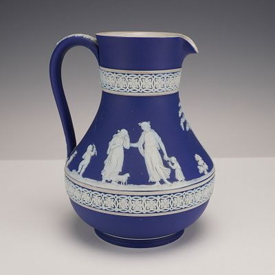 Wedgwood Dark Blue Jasperware Pitcher. A Wedgwood Dark Blue Jasperware Pitcher with a deep blue 