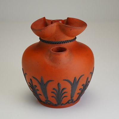 Wedgwood Rosso Antico and Black Basalt Pyryphorous Vase. The vessel features a bulbous body with 