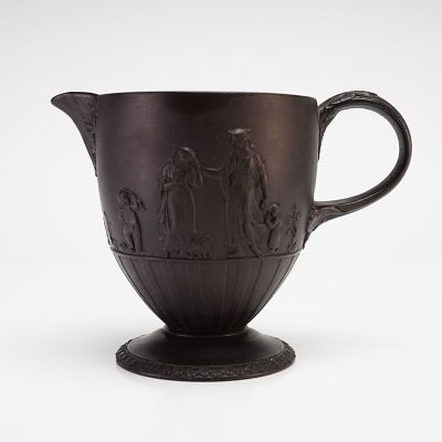 Wedgwood Black Basalt Four Home Nations Creamer. A Wedgwood black basalt creamer featuring the 