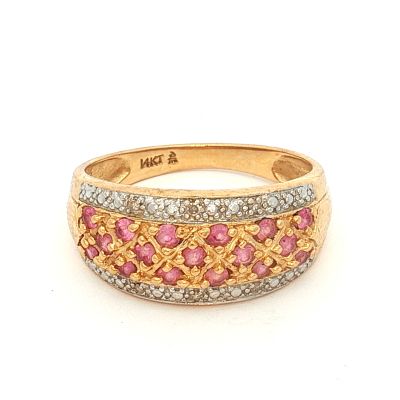 14K Yellow Gold Pink Sapphire and Diamond Ring. Yellow gold ring featuring a slightly domed 