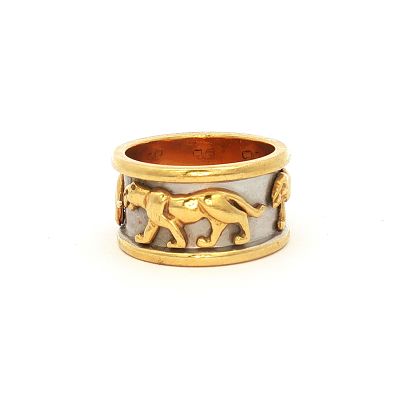 18K Two-Tone Gold Walking Panther Band Ring. A wide band ring crafted from 18K yellow and white 