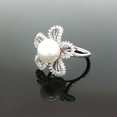 Estate 18K White Gold South Sea Pearl and Diamond Ring. An estate cocktail ring featuring a 