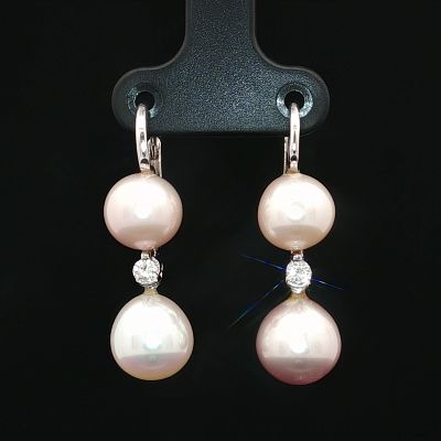 18K White Gold Diamond and Pearl Leverback Drop Earrings. A pair of white gold earrings 