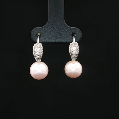 18K White Gold Diamond and Pearl Leverback Earrings. A pair of white gold leverback earrings set 