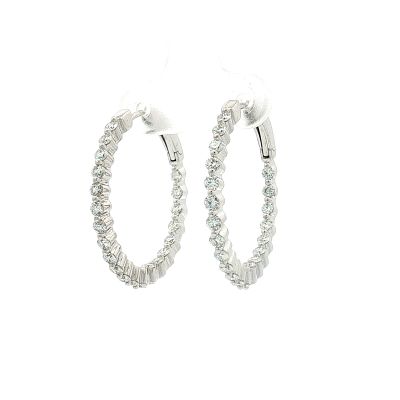 Pair of 14K White Gold and 1.43ctw Diamond Inside Out Hoop Earrings. These 14K white gold hoop 