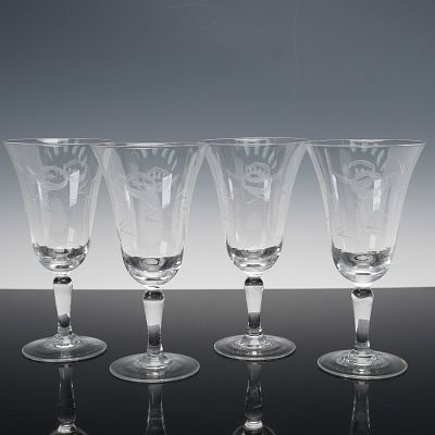 4pc Etched Crystal Floral Motif Water Goblets. A 4-piece set of etched crystal water goblets 