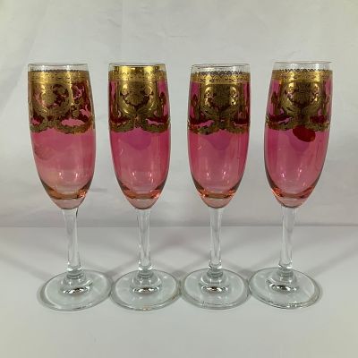 A Set of Four Vintage Italian Pink Glass Champagne Flutes with Gold Gilt Overlay. A set of four 