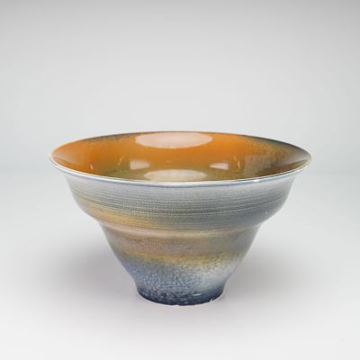 Wedgwood Experimental Glaze Bone China Bowl. This Wedgewood vessel is characterized by a flared 