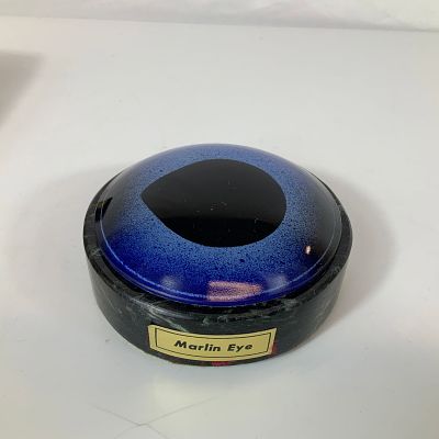 Clara Bartsch Imports Marlin Eye Stone Paperweight. This circular decorative paperweight is 