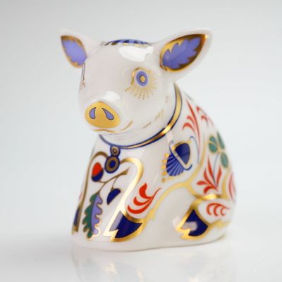 Royal Crown Derby Paperweight Sitting Piglet with Box. The piece features intricate polychrome 