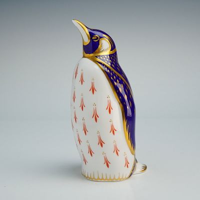 Royal Crown Derby Paperweight, Emperor Penguin. The figure is decorated in a traditional Imari 