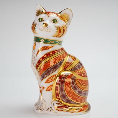 Royal Crown Derby Paperweight, Marmaduke Cat. A Royal Crown Derby paperweight depicting a seated 