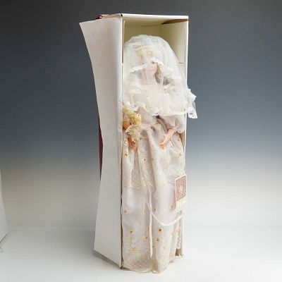 Dynasty Doll Collection Porcelain Doll, 1995 Annual Bride. This collectible doll is part of the 