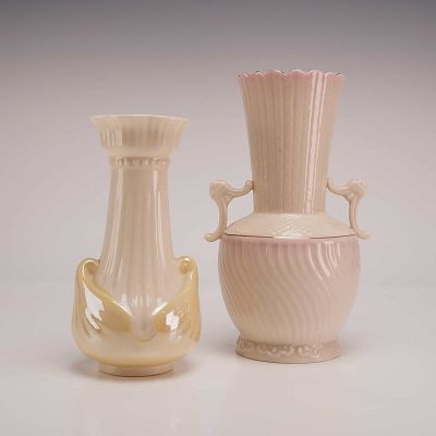 Two Piece Belleek Irish Parian Porcelain Vases. The first vase is a small, two-handled vessel 